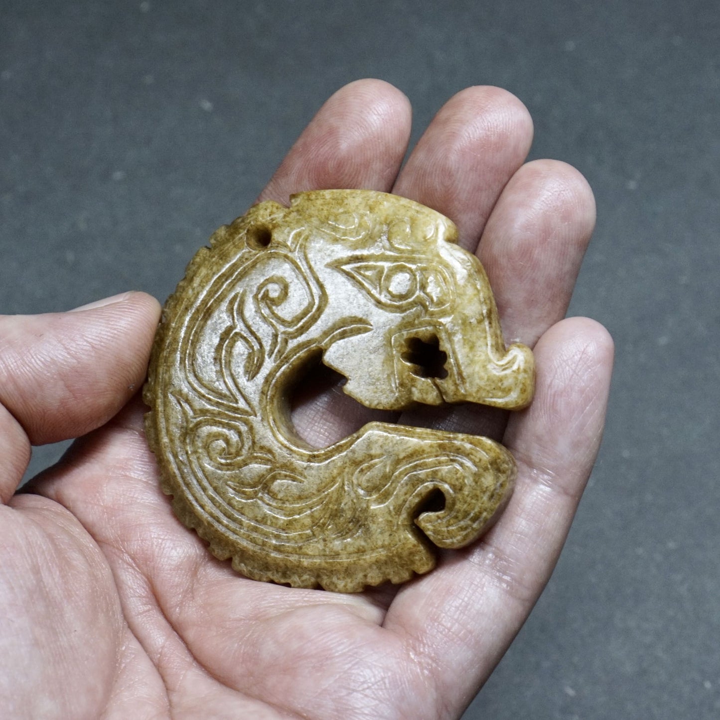 C-shaped dragon pendant
