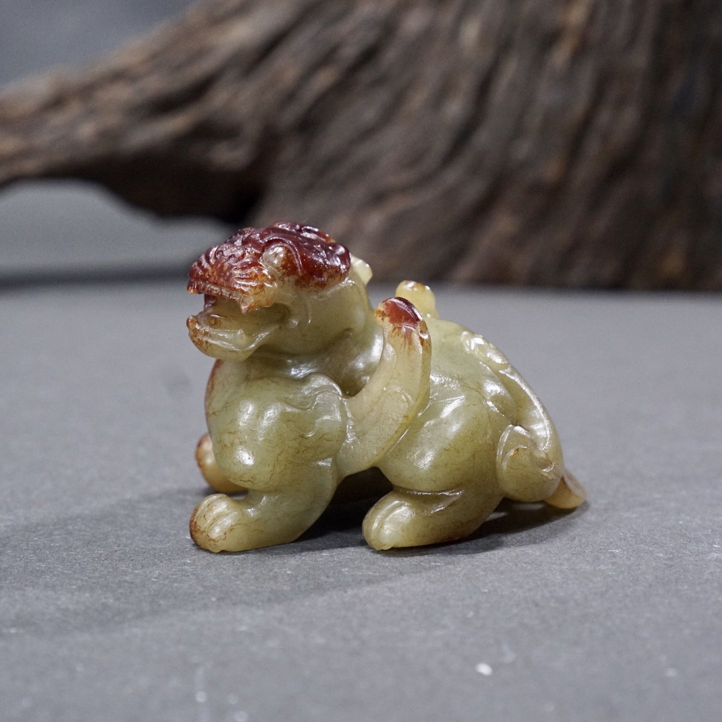 Round carved red jade evil-repelling beast - Good Luck