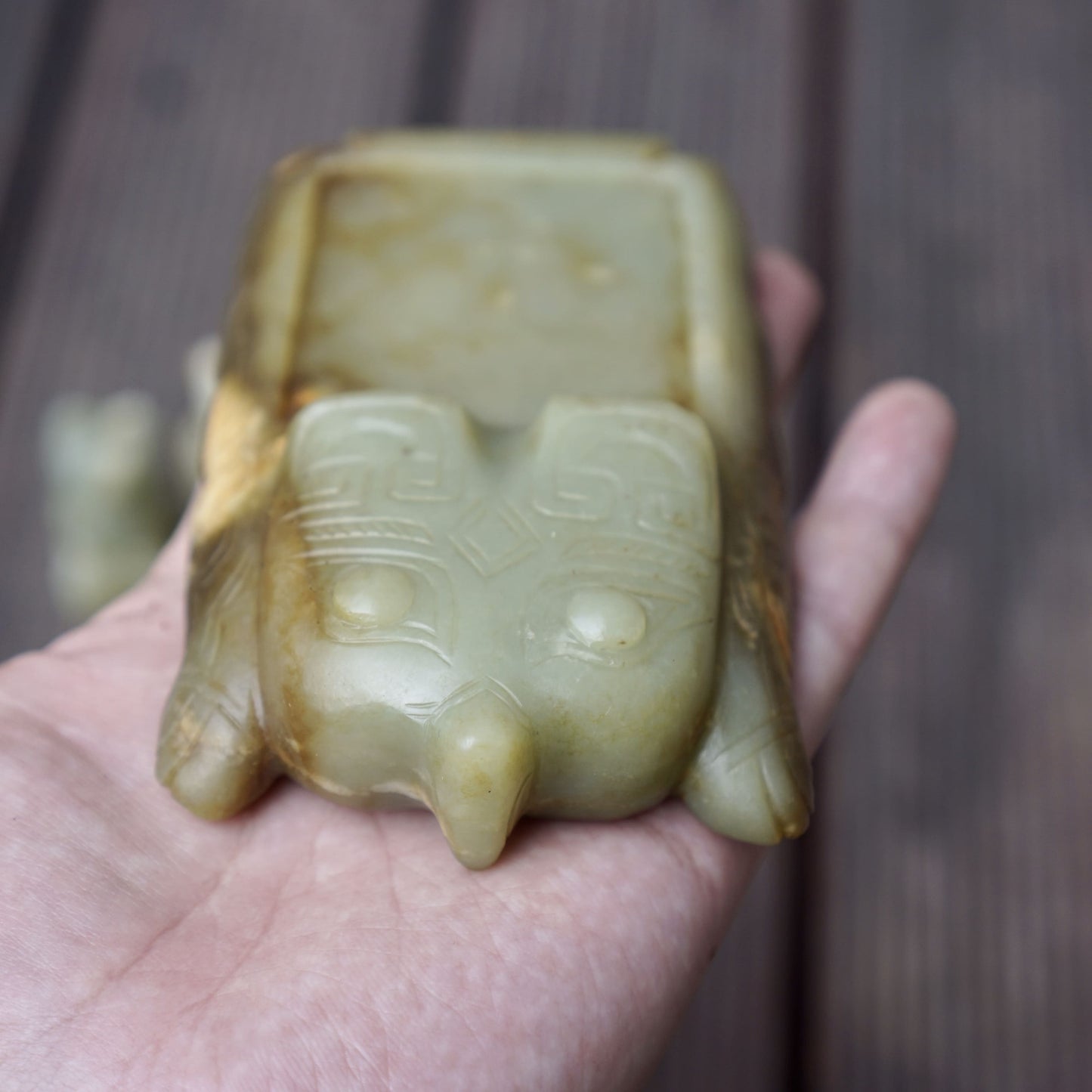 A set of jade seals with a bird carrying four sacred beasts