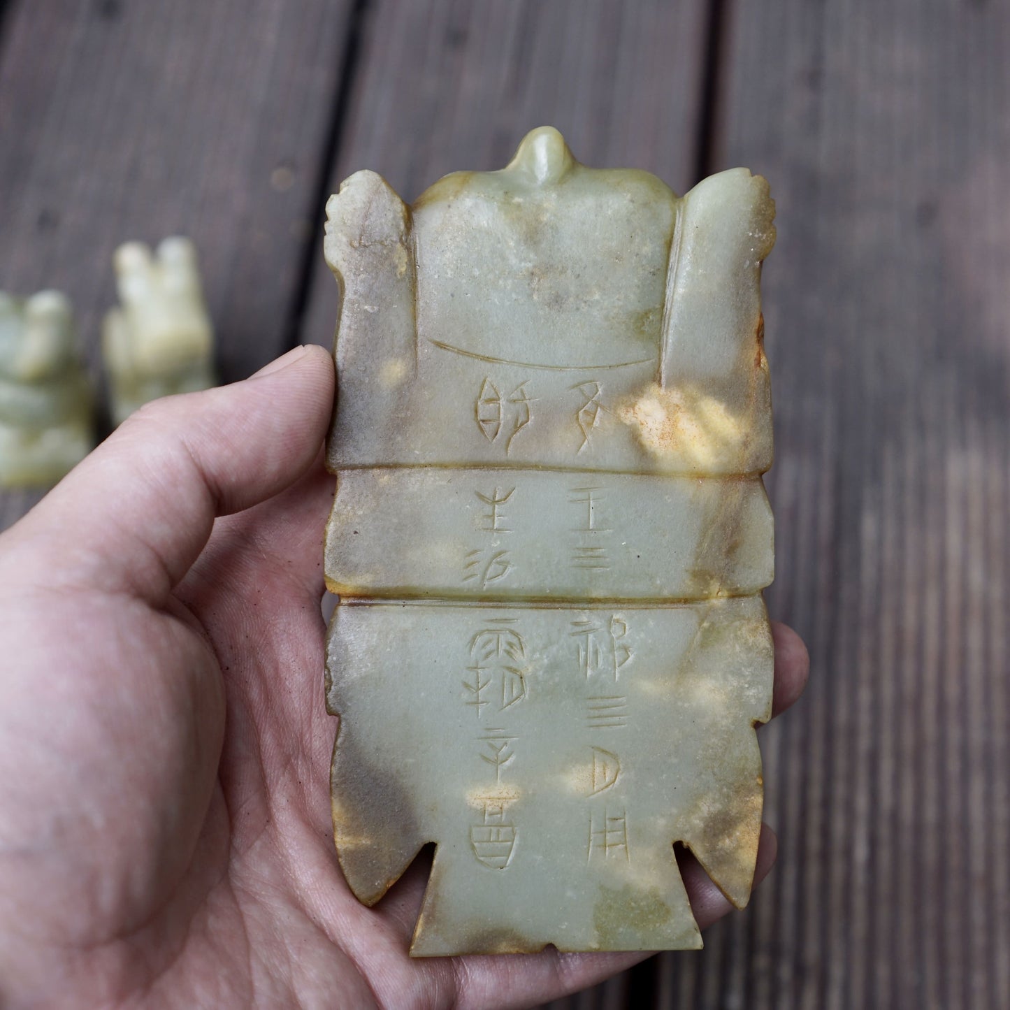 A set of jade seals with a bird carrying four sacred beasts