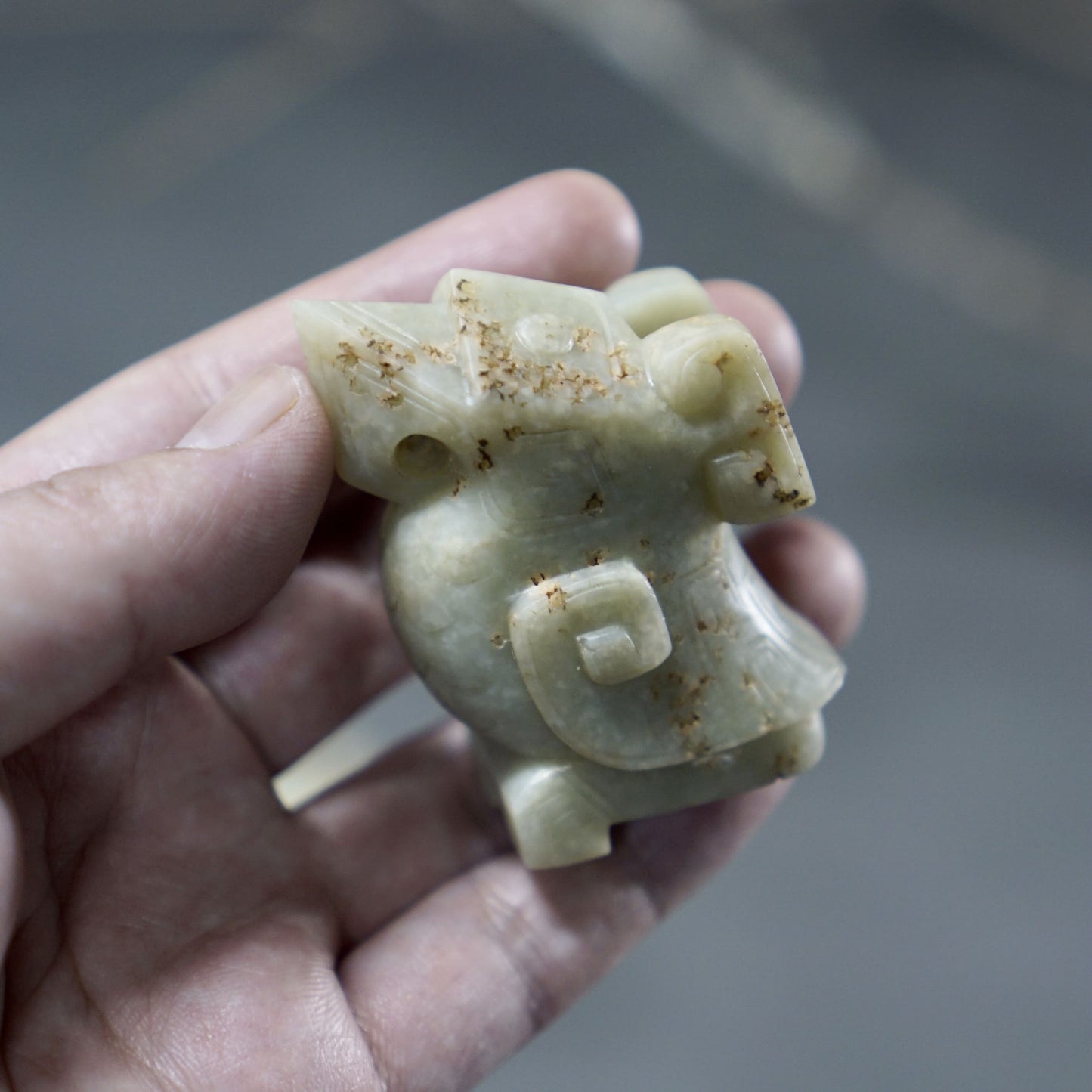 A pair of jade owls carved in the round