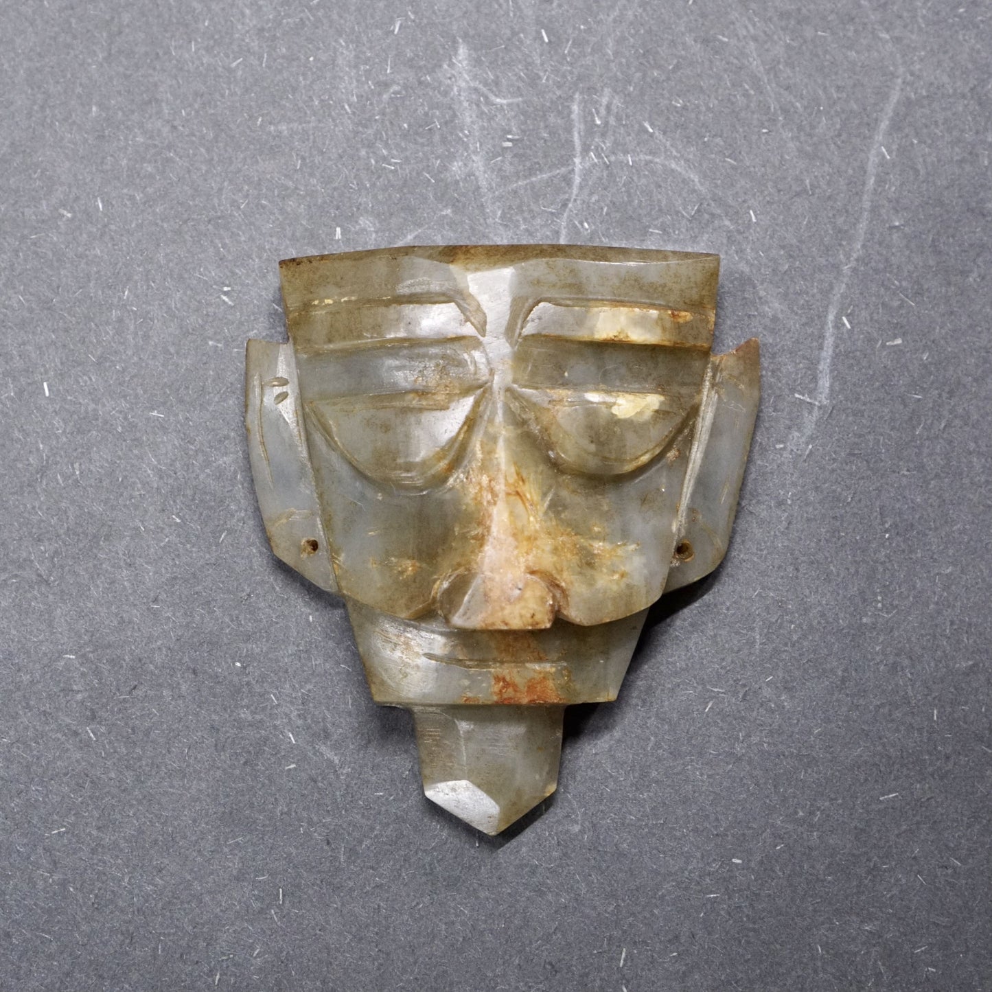 Jade head of a human being from the late Neolithic period