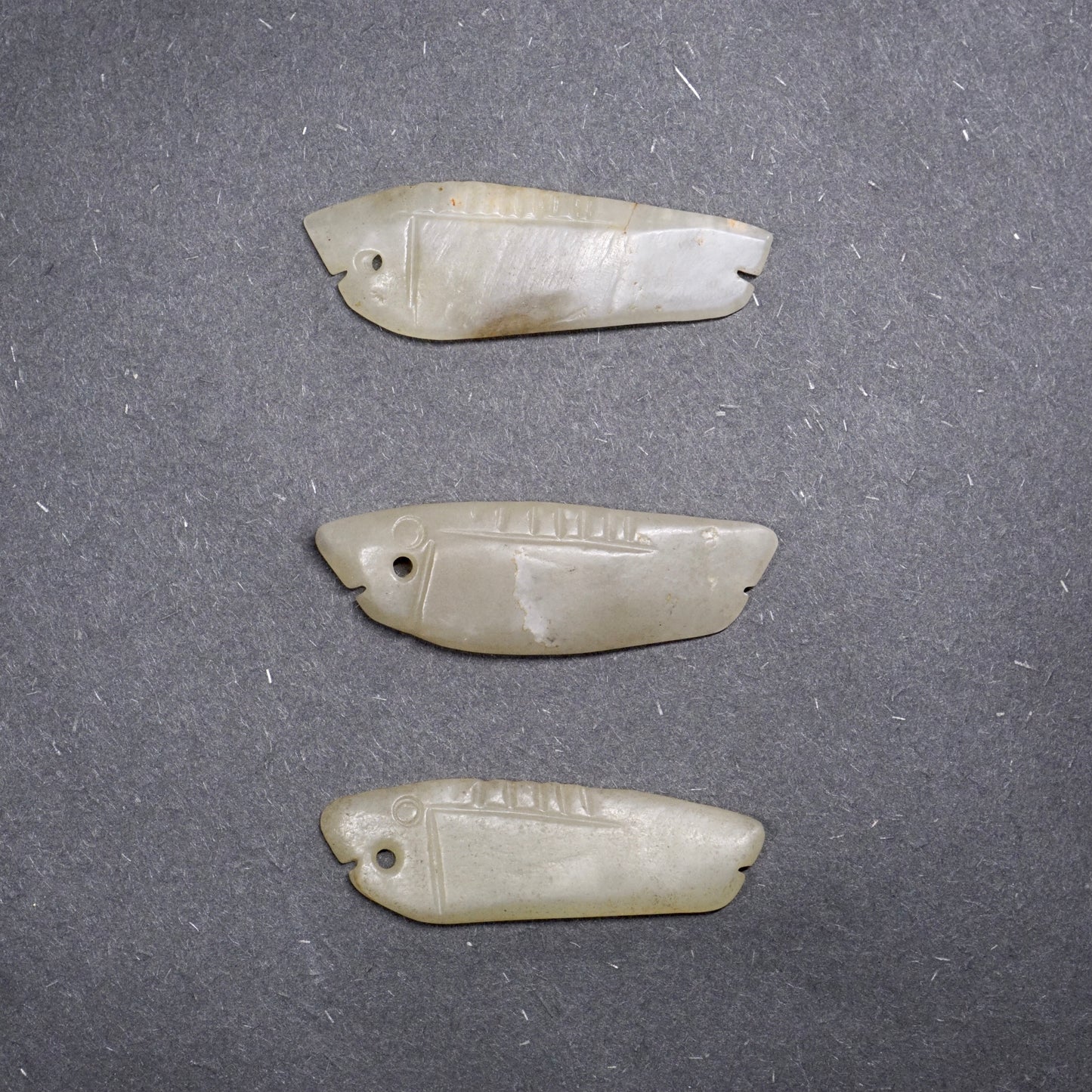 White jade long strip carved jade fish (three pieces in a group)