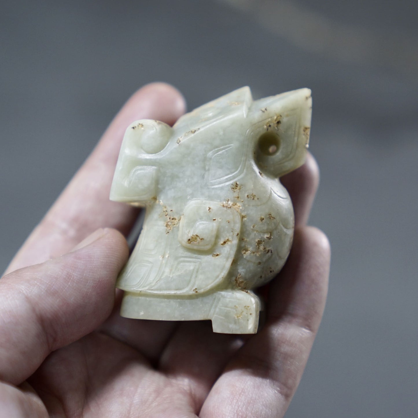 A pair of jade owls carved in the round