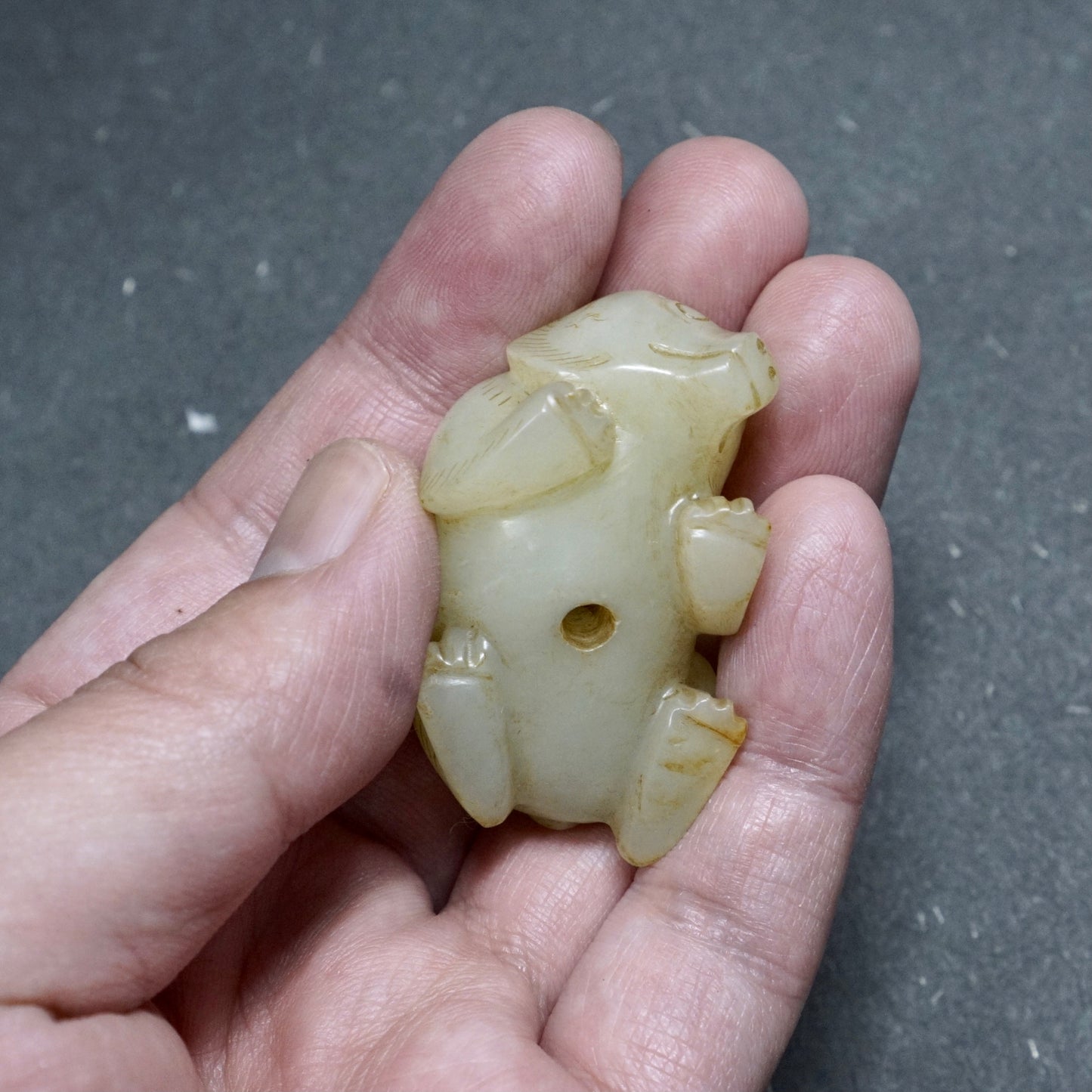 Han pair of pierced fine white jade bear