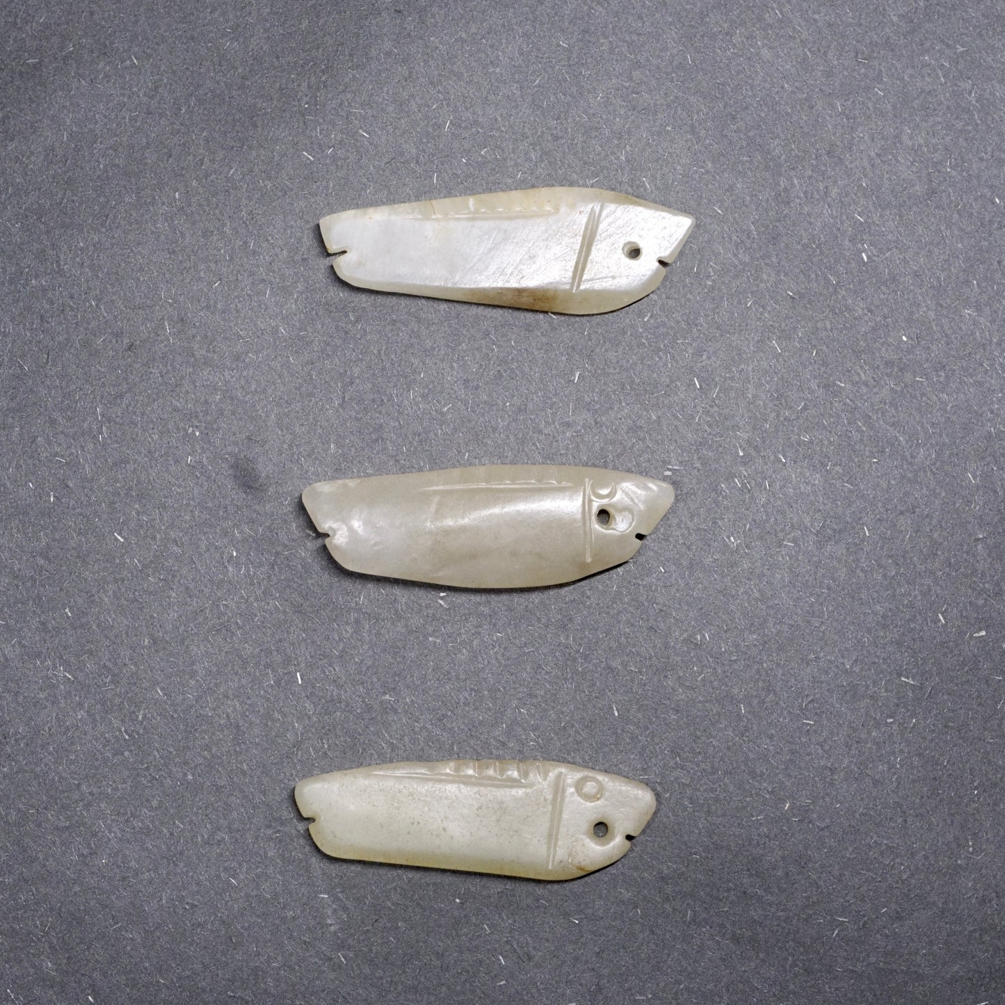 White jade long strip carved jade fish (three pieces in a group)