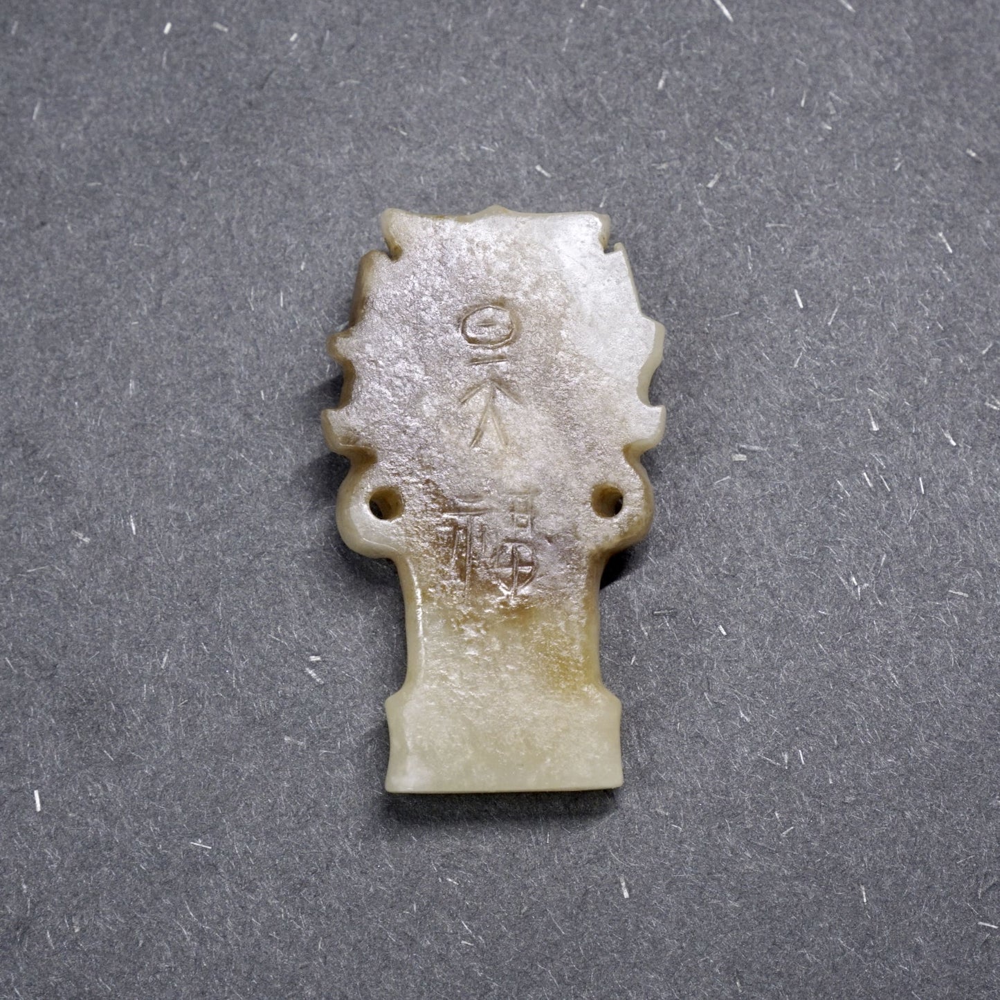 Back engraved with inscription jade head-A