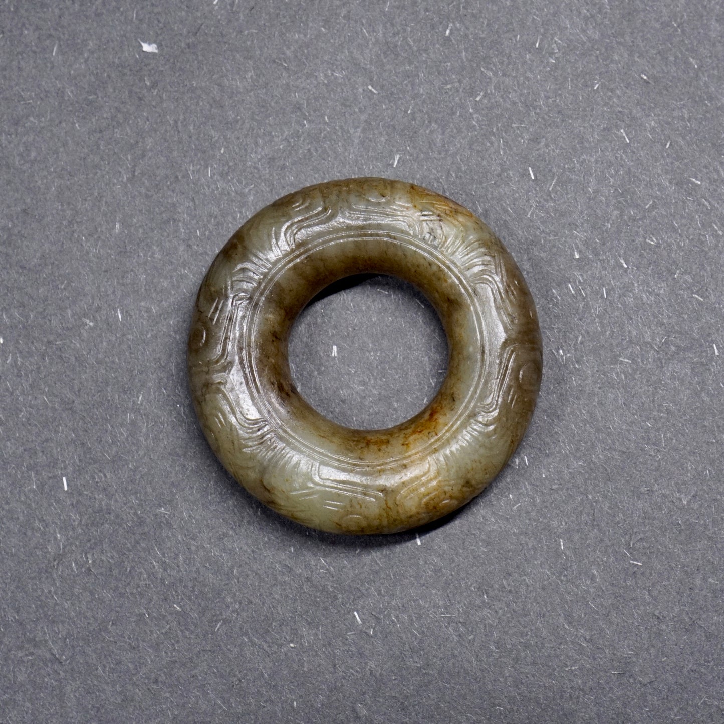 Jade ring with human face pattern