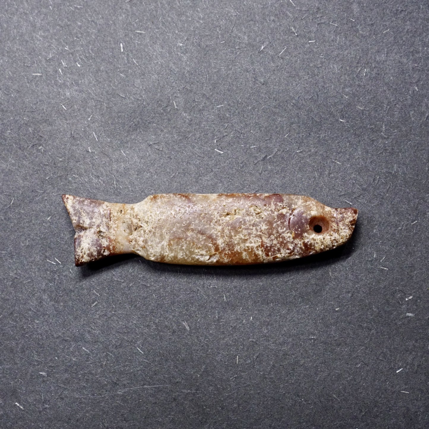 Late Neolithic carved jade fish pendant