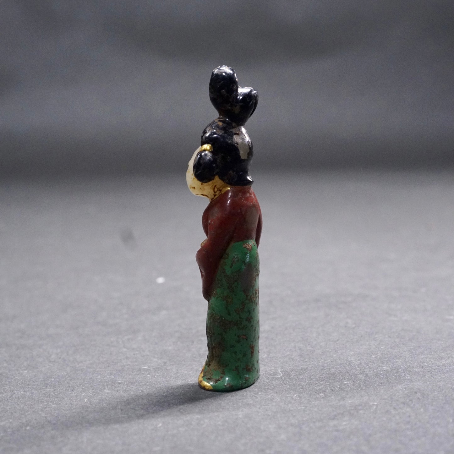 A Tang Dynasty Gilded and Painted Hetian White Jade Lady