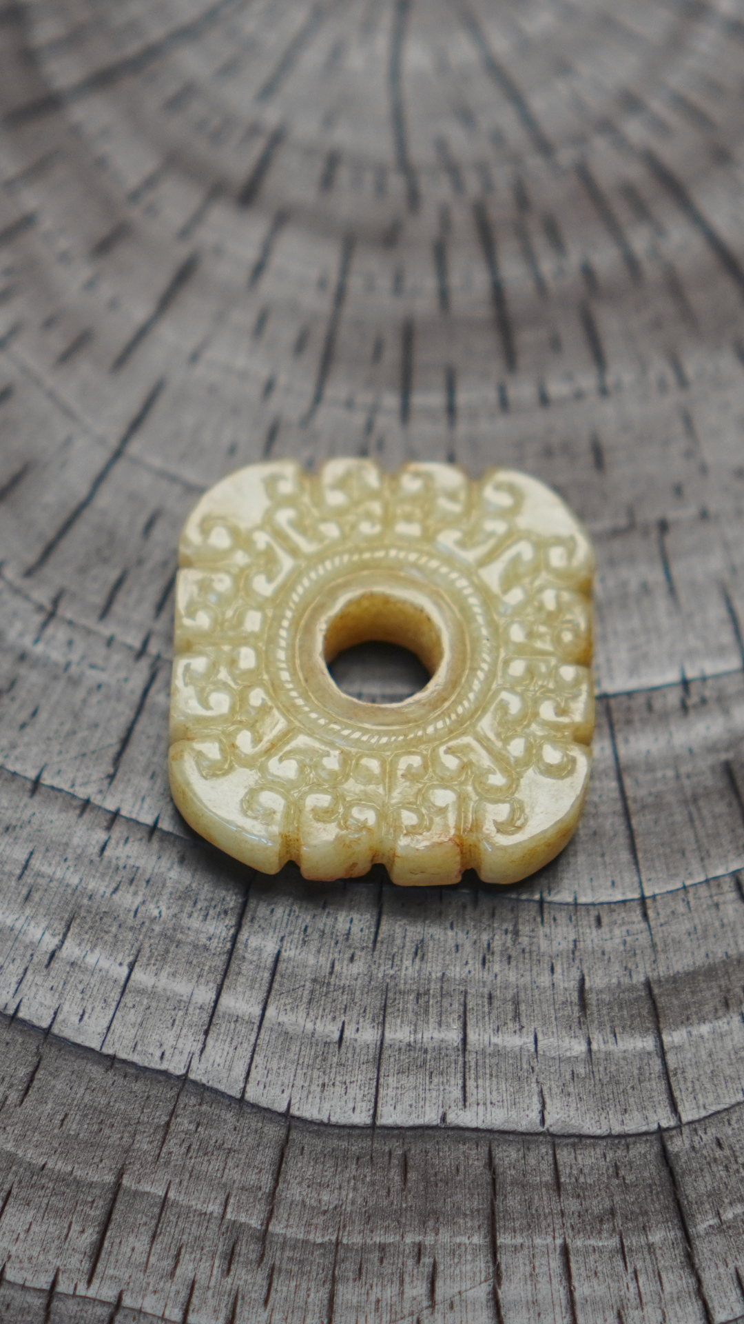 Warring States and Han Dynasty style white jade double-sided square pendant with intricate cloud pattern.