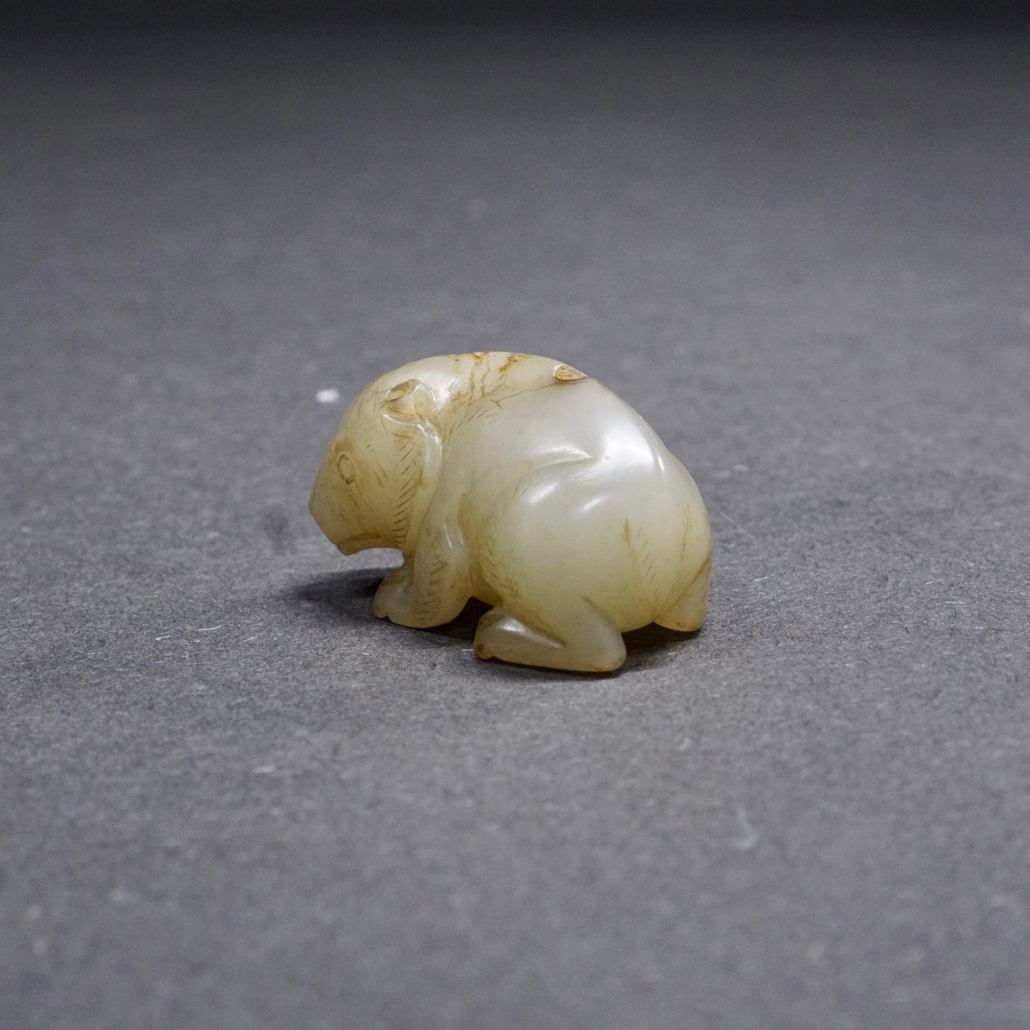 Han pair of pierced fine white jade bear