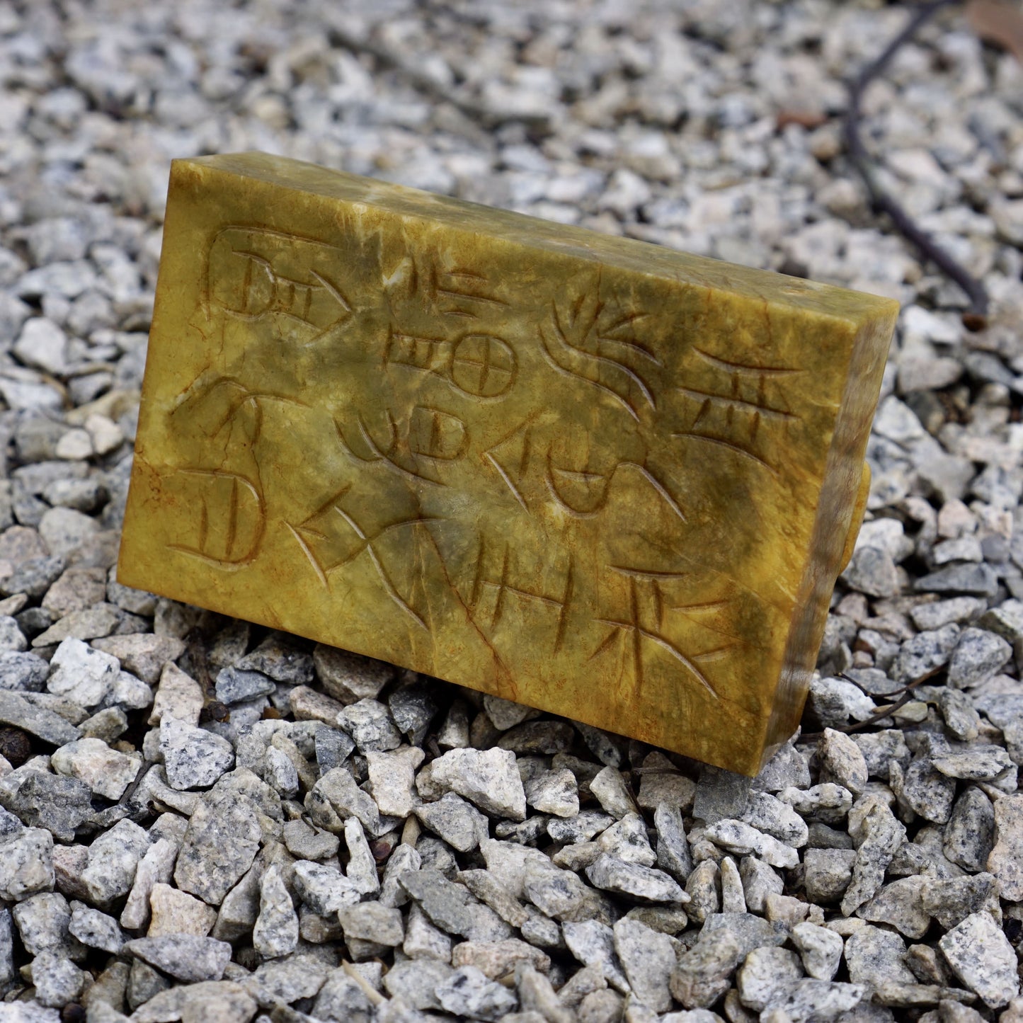 A jade seal with round-carved owl and dragon