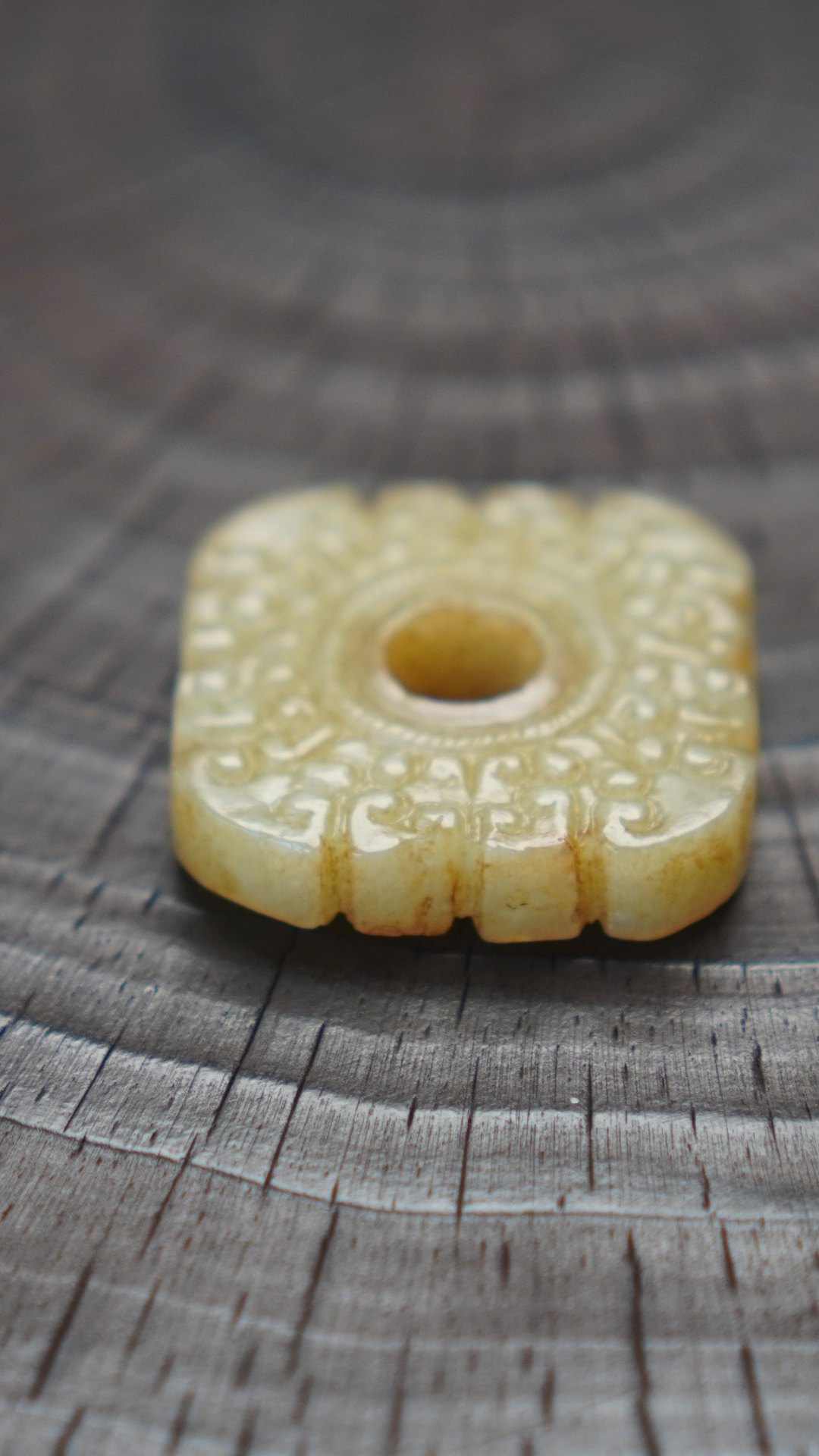 Warring States and Han Dynasty style white jade double-sided square pendant with intricate cloud pattern.