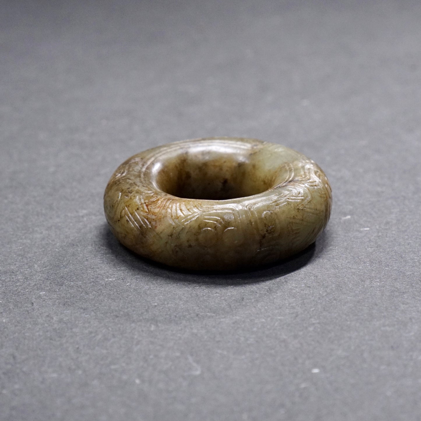 Jade ring with human face pattern