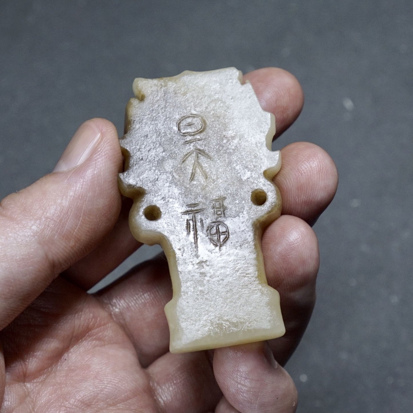 Back engraved with inscription jade head-A