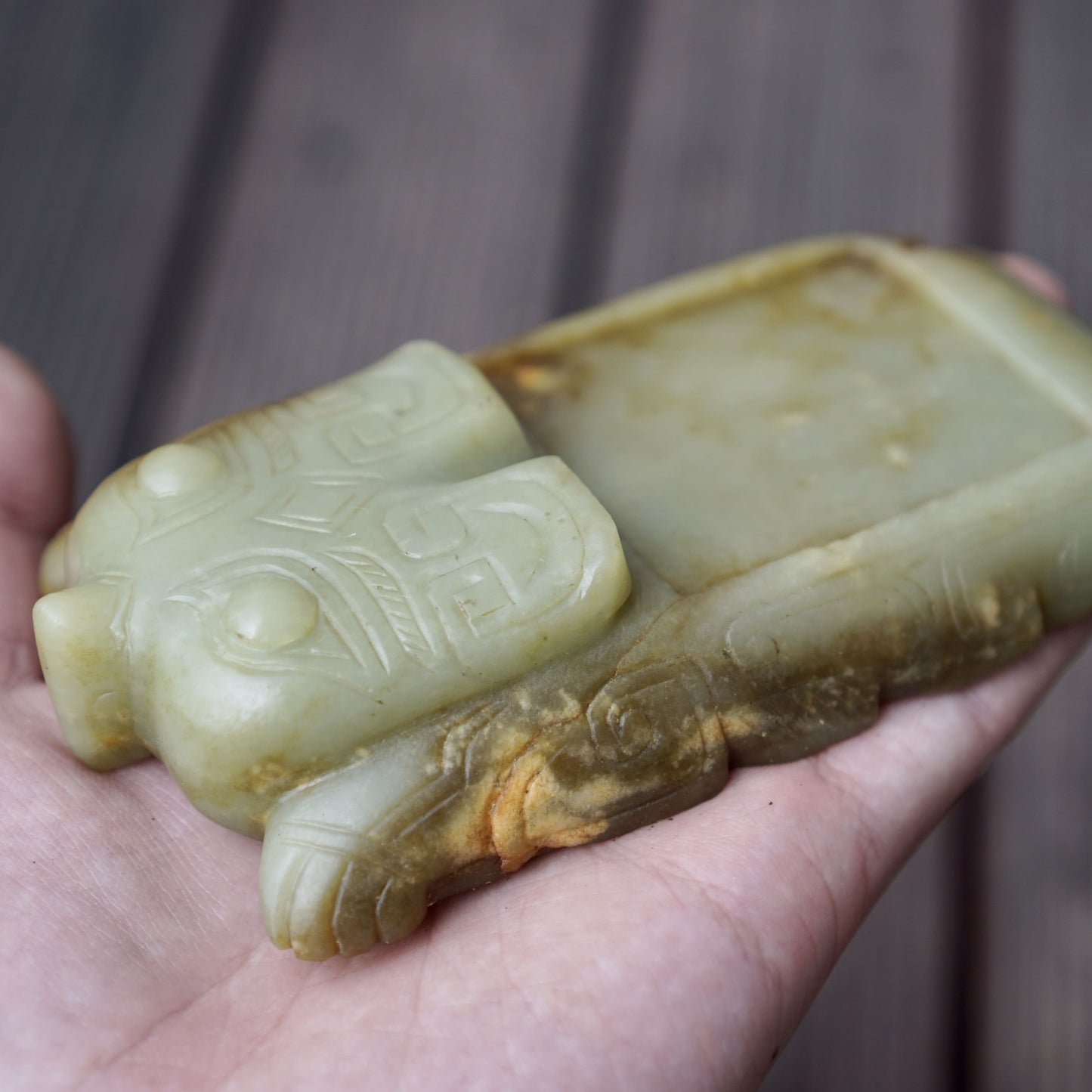 A set of jade seals with a bird carrying four sacred beasts